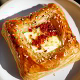 Chili Crisp Honey Brie Bites