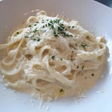 Smooth, blended Cottage Cheese Alfredo Sauce simmering in a pan, ready in minutes.