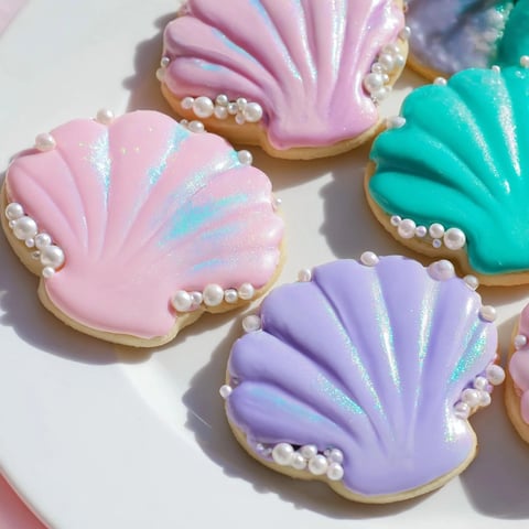 These seashell sweets are enchanting sugar cookies, perfect for any mermaid-themed party.