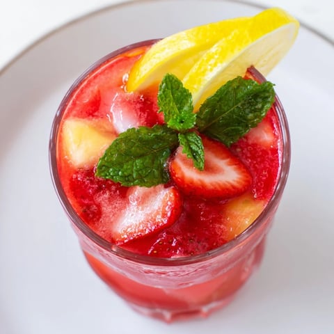 Homemade fruit refresher drinks in vibrant colors, a refreshing homemade take on Starbucks drinks.