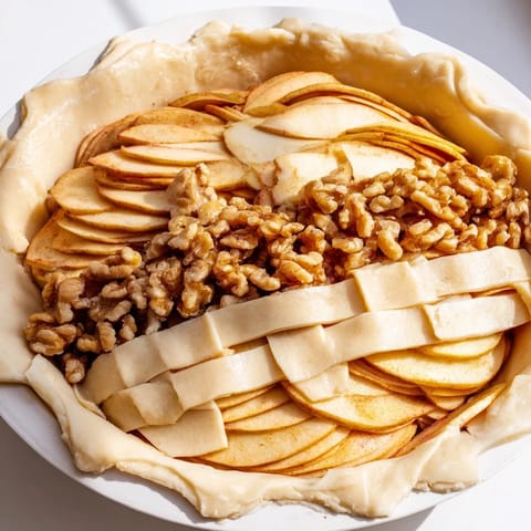 This Lattice Orchard showcases a beautiful apple lattice over a walnut and honey filling, perfect.