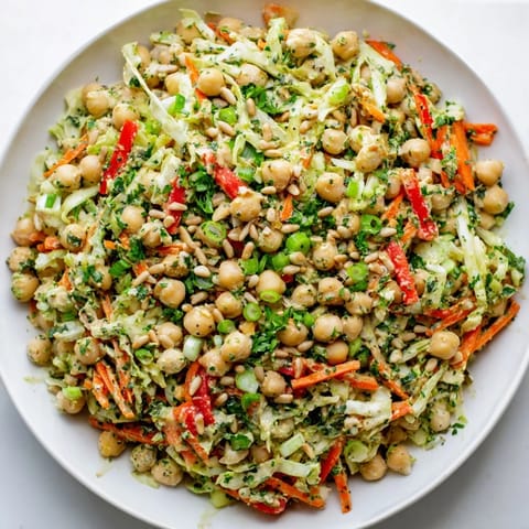 A close-up of Fiber-Forward Chickpea Salad, highlighting fresh ingredients perfect for a healthy lunch.