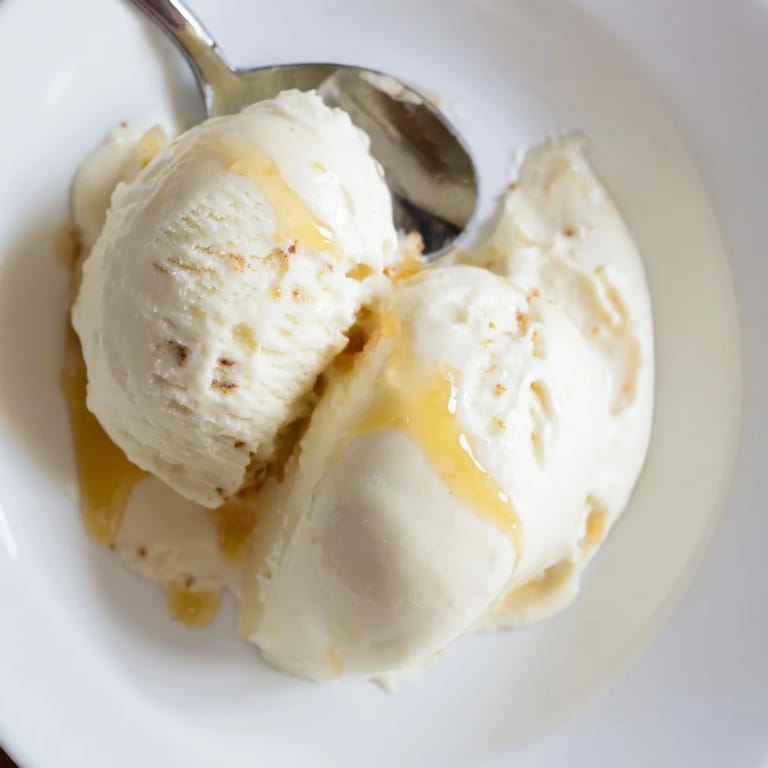 A vibrant photo of homemade cottage cheese ice cream, ready to be scooped and enjoyed.